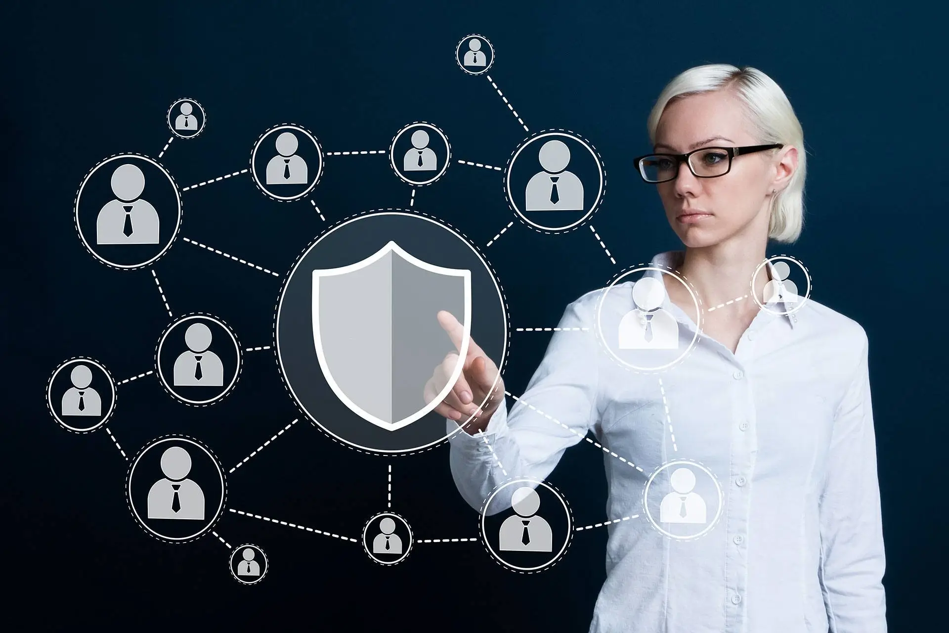 Professional woman ensuring cybersecurity in digital network with shield symbol, safeguarding connections.
