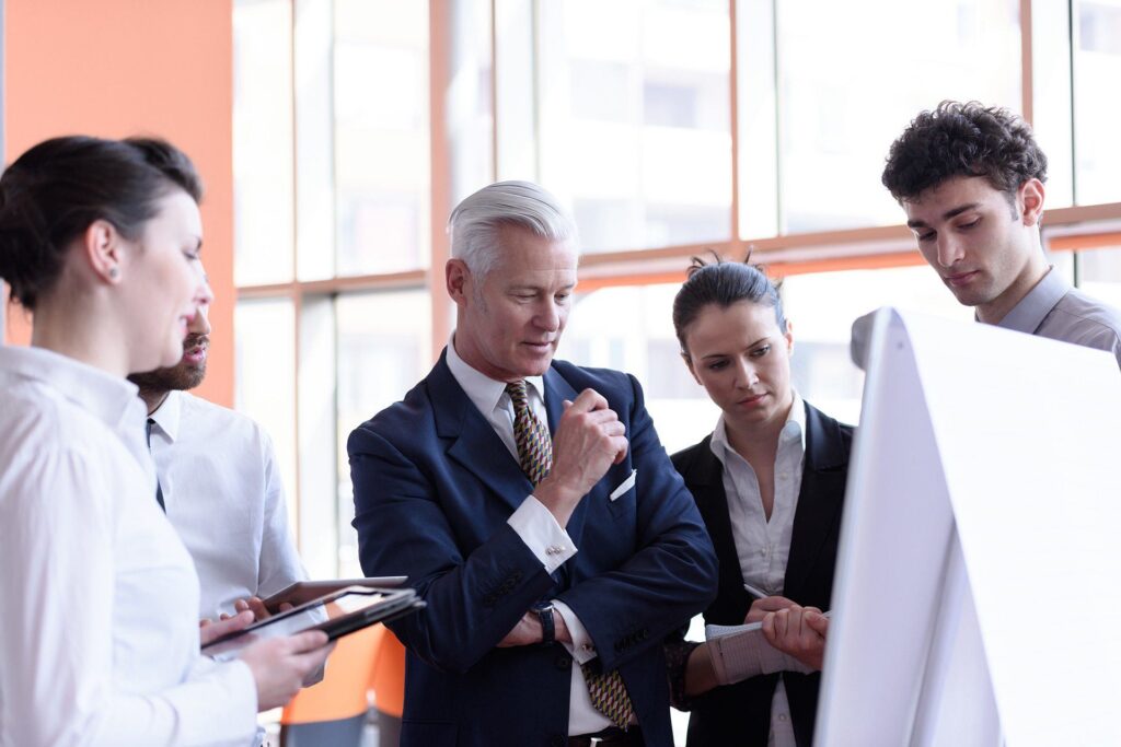 professional team collaboration in modern office setting, fostering innovation and communication. business ready.