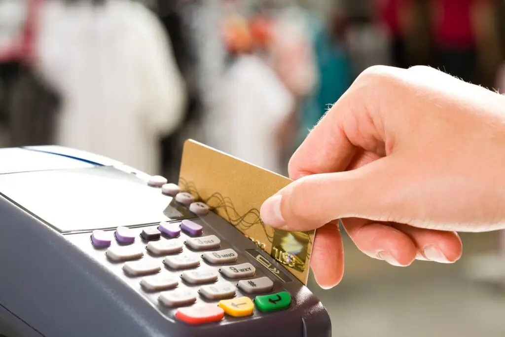 Modern Digital Payment At A Busy Retail Checkout. Pci Compliant. modern digital payment at a busy retail checkout. pci compliant.