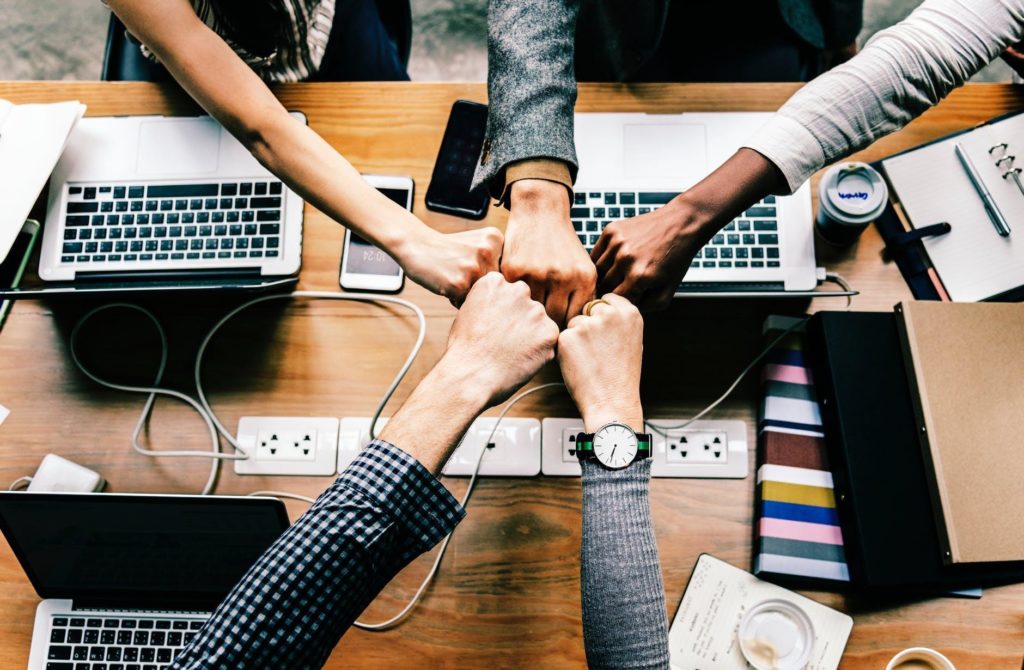 collaborative team uses technology for innovative productivity in modern workspace. security.