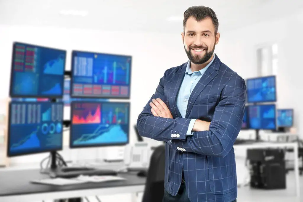 stylish man in tech-savvy office, exuding confidence and professionalism. it services.