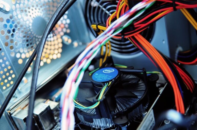 colorful cables and cpu cooler showcase intricate design and functionality in computer case, outsourcing it