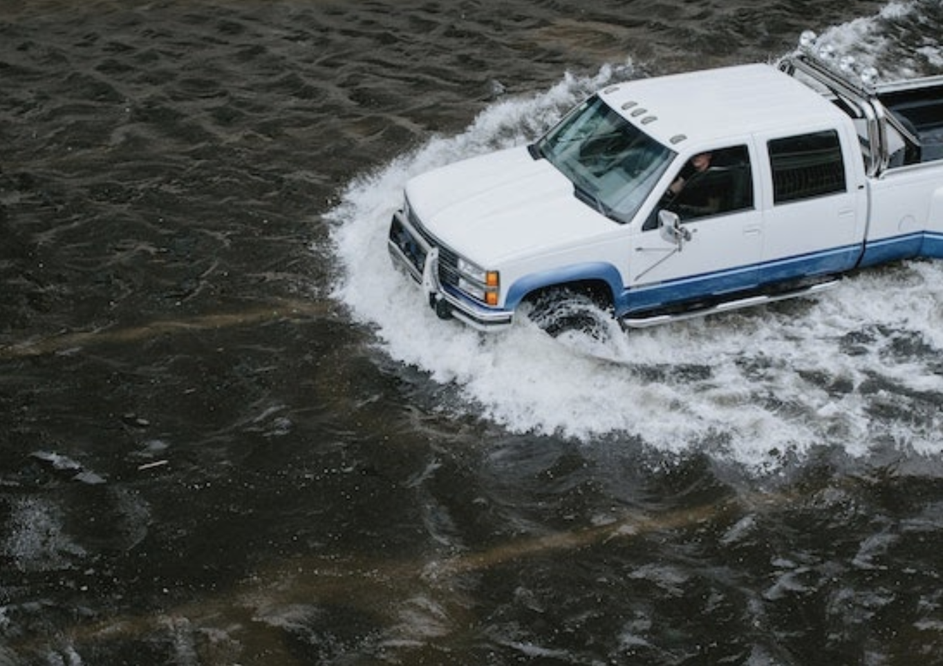 car going through water