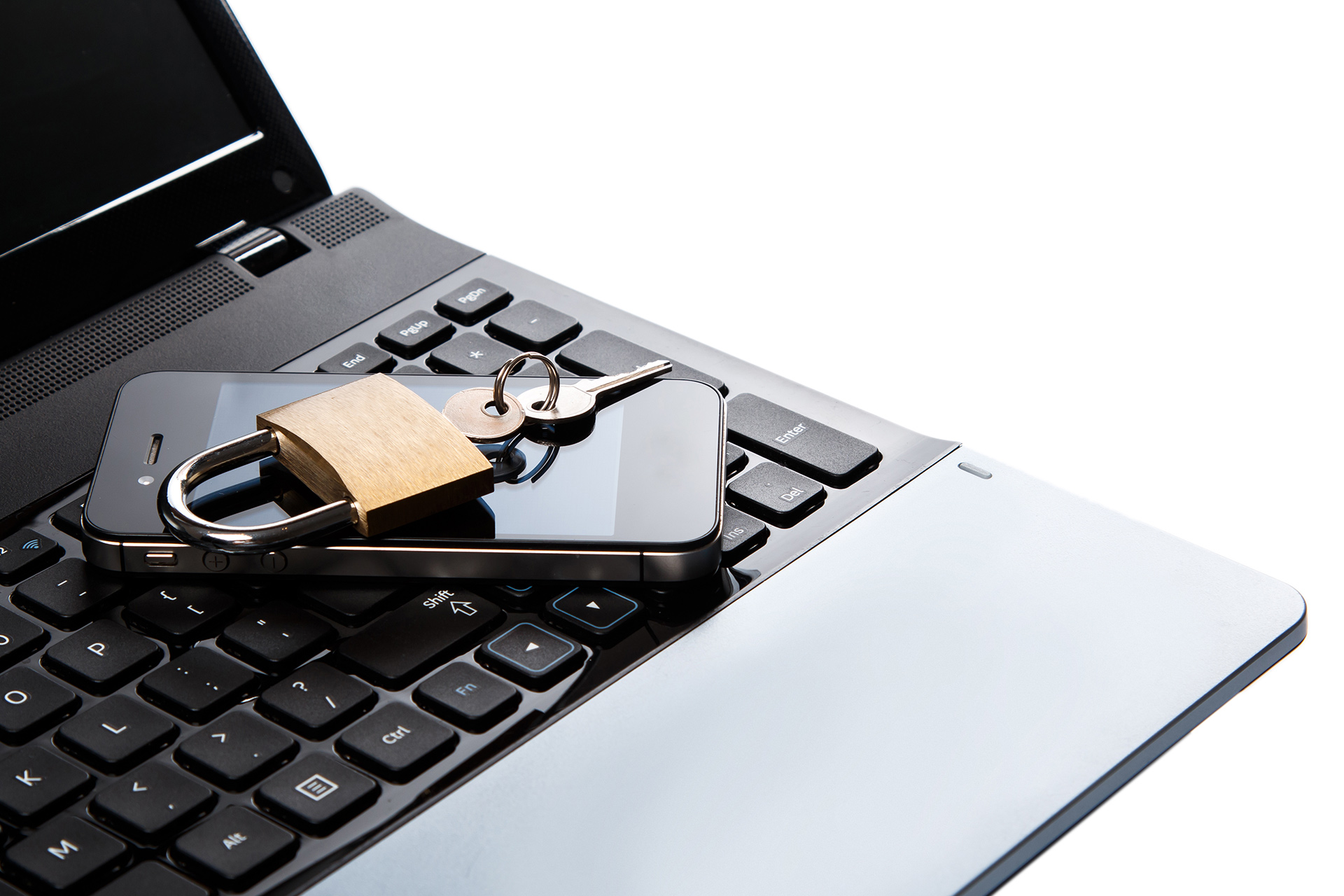 a padlock on top of a laptop keyboard