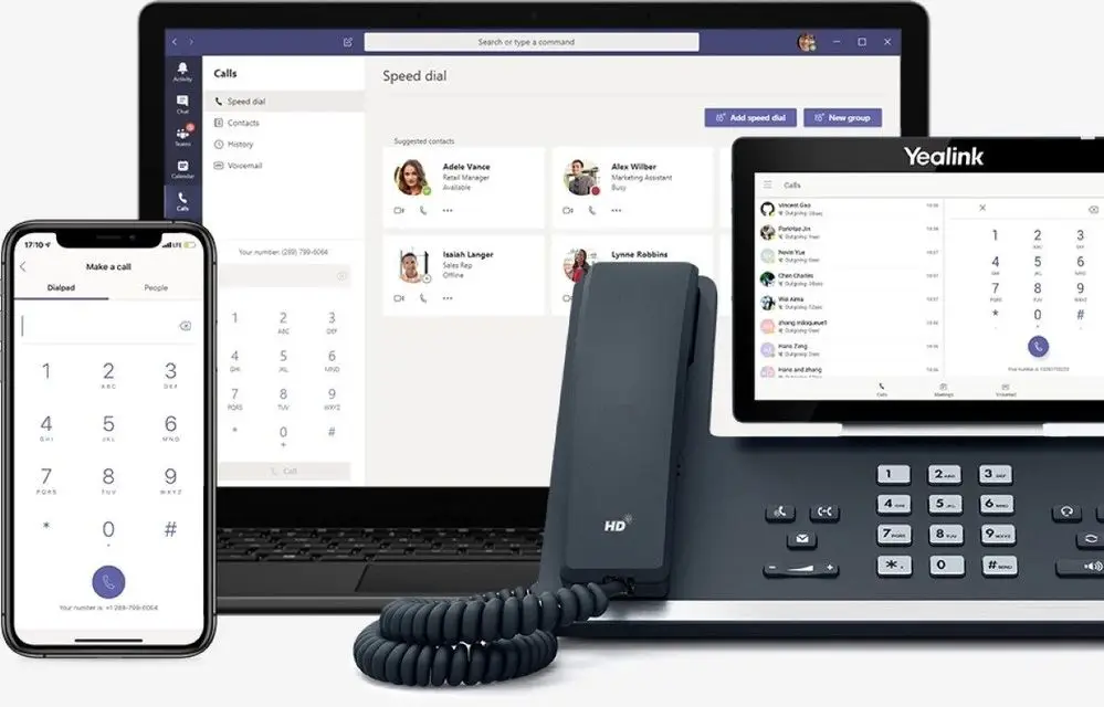 Modern Communication Setup With Laptop, Smartphone, And Desk Phone For Seamless Collaboration. modern communication setup with laptop, smartphone, and desk phone for seamless collaboration.