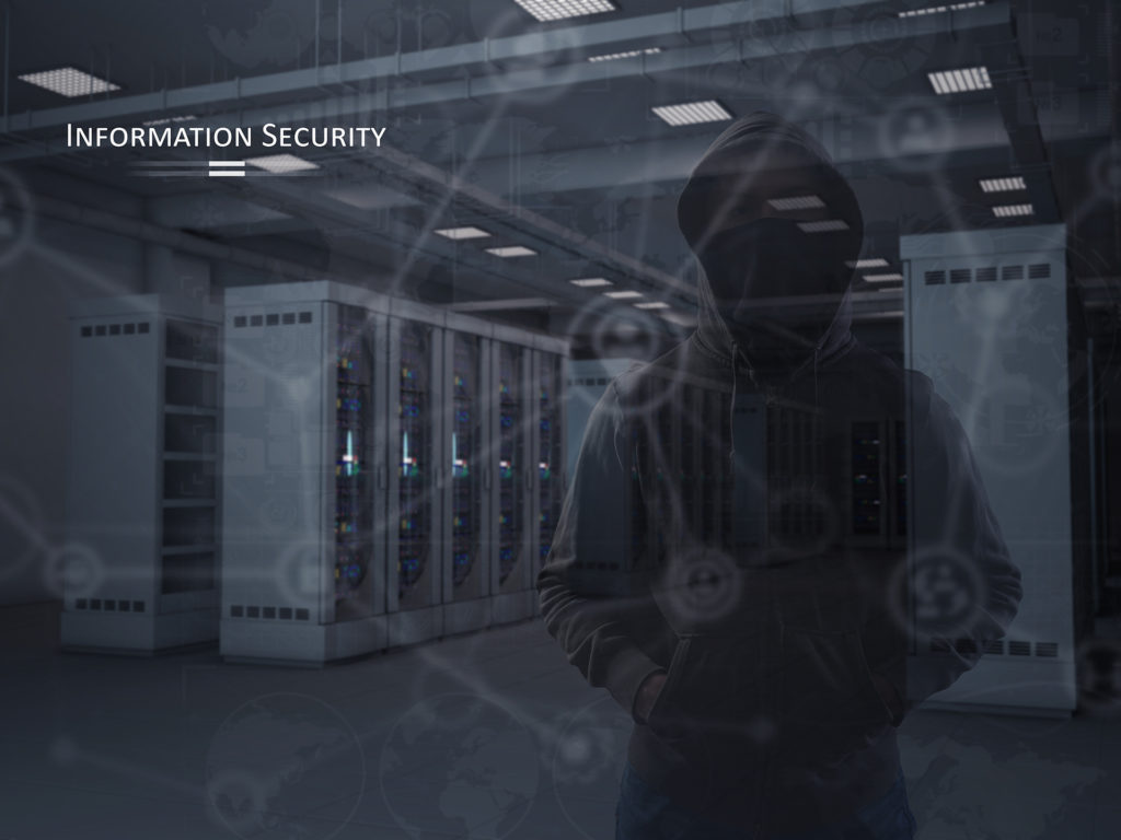 securing data: mysterious figure in hoodie among servers, emphasizing protection.