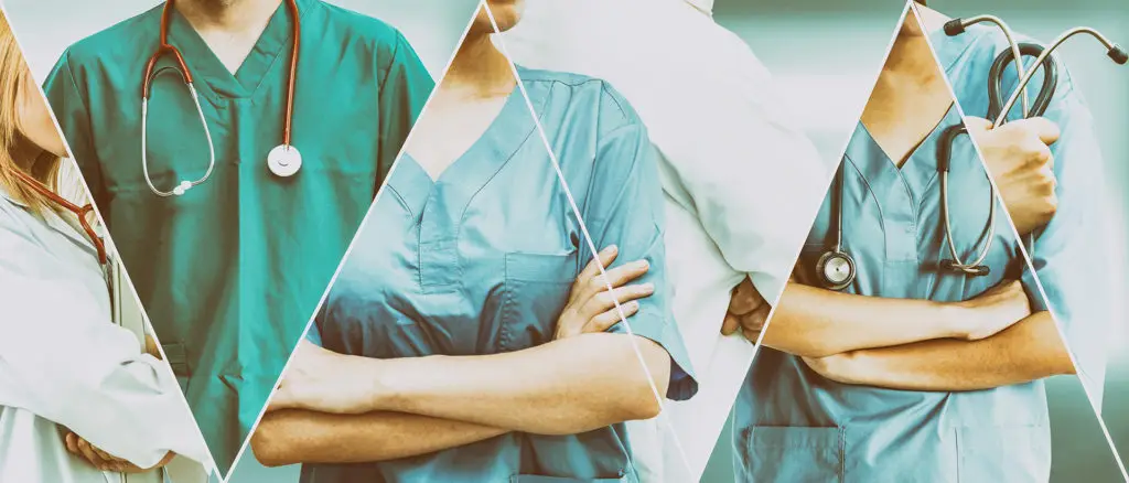 Diverse Healthcare Professionals Exuding Unity, Commitment, And Teamwork In Blue And Green Attire. diverse healthcare professionals exuding unity, commitment, and teamwork in blue and green attire.