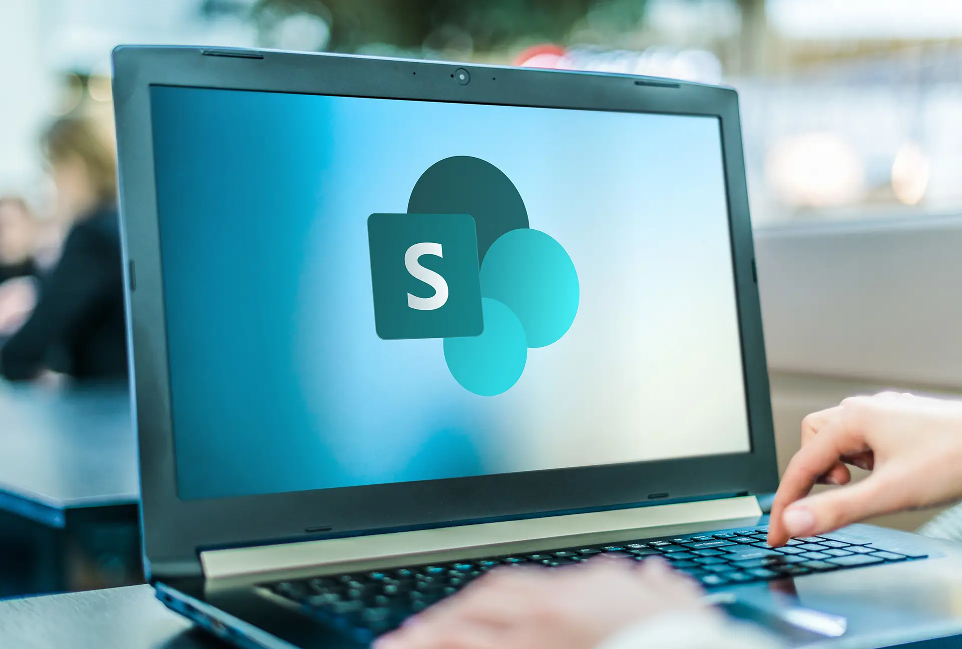 Dynamic collaboration software on sleek laptop for modern digital workspace.