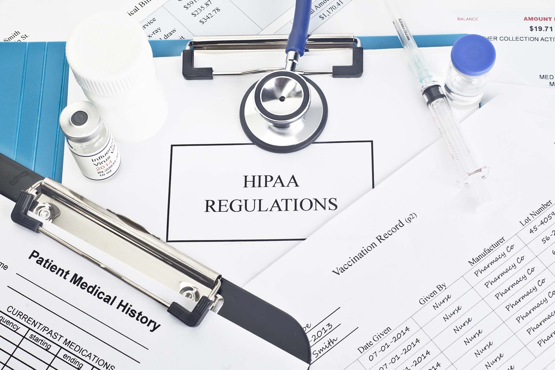 a clipboard with the words hipaa regulation on it