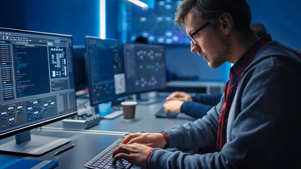 Tech-Savvy Colleagues Collaborate On Coding Tasks In Modern, Innovative Workspace. tech-savvy colleagues collaborate on coding tasks in modern, innovative workspace.