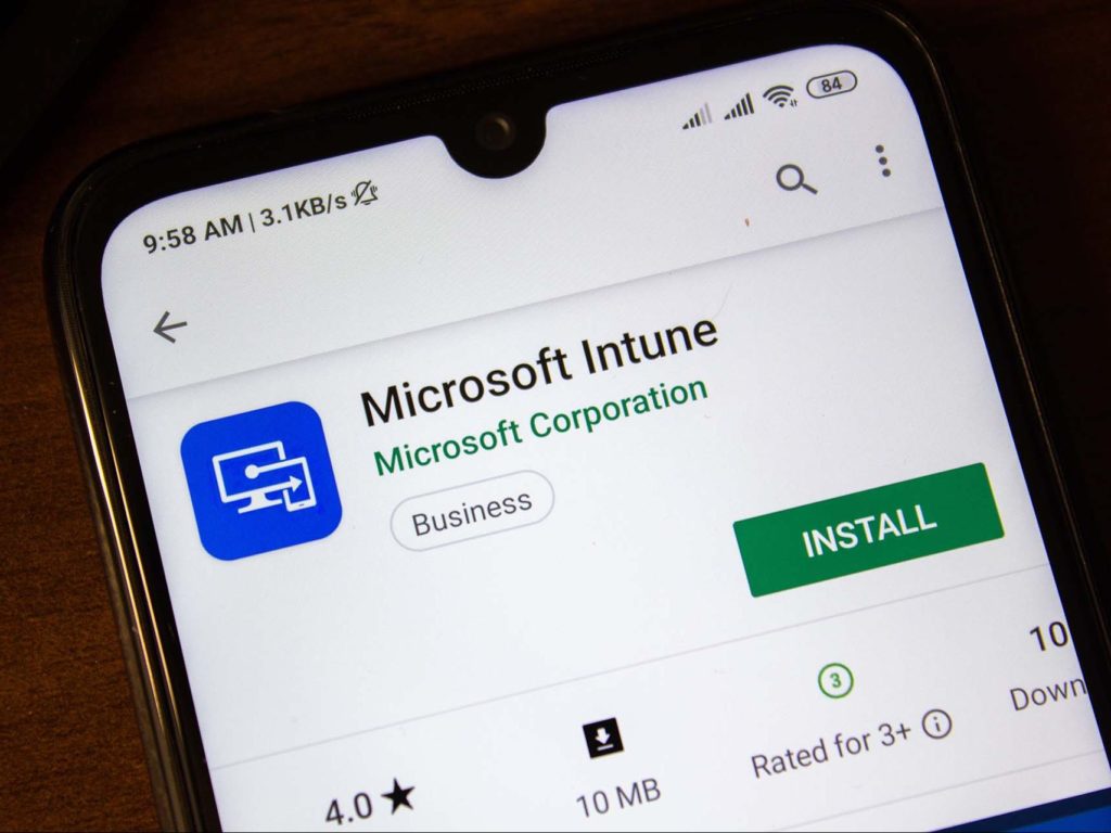 a cell phone with the microsoft intune logo on it