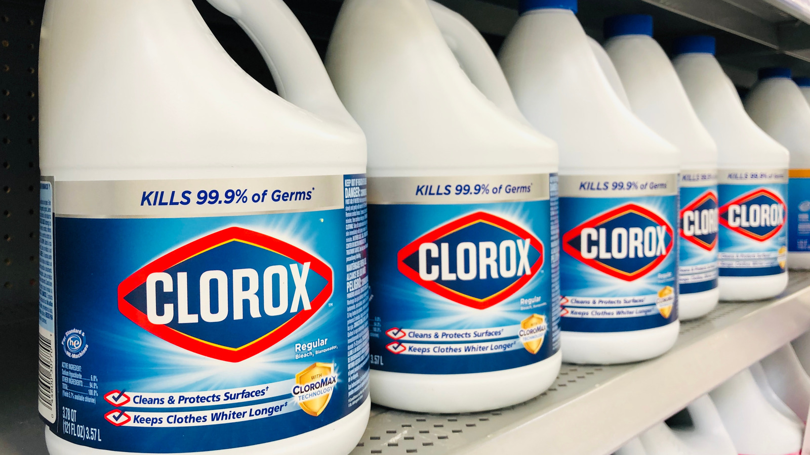 several bottles of clorox on a shelf