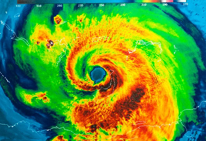Powerful hurricane swirling in the Atlantic Ocean, showcasing intensity and potential impact.