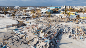 recovery efforts in devastated coastal area after a disaster, showcasing resilience and rebuilding.