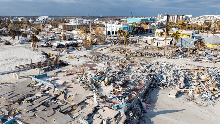 recovery efforts in devastated coastal area after a disaster, showcasing resilience and rebuilding.