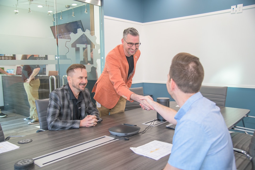 dynamic and professional modern meeting room with engaged business professionals.