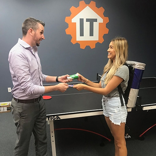 dynamic teamwork in modern technology office space with interaction and recreational activities.