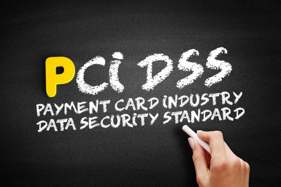 a hand writing on a blackboard with the words cip95s payment card industry data security